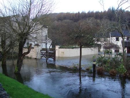 Floodwater surrounds the Whitewater Hotel, pic by Paul Coulson of Backbarrow.
