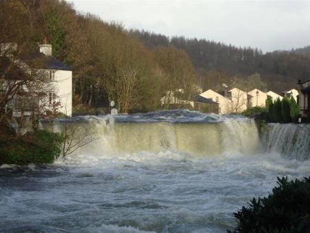 The bridge at the Whitewater Hotel immersed in flood water, sent in by Paul Coulson
of Backbarrow.