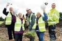 At the site of the new hall are from left, Building Village Hall Committee trustee Glenda Burton, chairman Ray Broomby, trustees Les Baines and Joyce Keetley, and Graham Bland of Cox & Allen builders