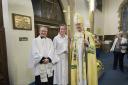 Picture shows the Rev John Davies with crucifer Annie Parker and the Rt Rev Nicholas Baines, Lord Bishop of Leeds.