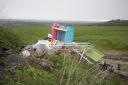 Rubbish dumped on farmland in the North West. Inset, Tony Laking