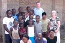 HOMELESS HOSTEL: Christopher and Mary Jenkin with orphans in Uganda