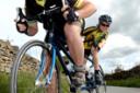Steve Launder and his son Connor, aged ten, practise for their Land's End to John O'Groats cycle ride.