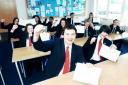 SUCCESS Haslingden High School students Frank Dominy and Owen Middlemas with fellow pupils