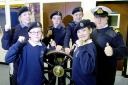 Celebrating the good news for Kendal Sea Cadets are, back left to right, Petty Officer Zoe MacPhee, Cadets Thomas Mellard, Luke Reid and Lt Clive Sumpter. Front Ethan Hayton and Catherine Brady