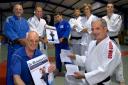 Kendal Judo Club members signing up to the organ donor campaign