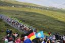 Crowds watch the Tour de France riders pass over the Buttertubs Pass, where Patrick McDonagh sustained fatal head injuries