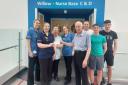 The cheque is handed over to the ward manager