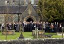 FAREWELL: Some of the hundreds of mourners