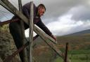 Richard Pedley working on his farm on the border of the Dales