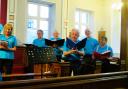 Community choir sings Ukrainian lullaby in town centre's chapel