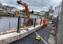 Installation of the new self-cleaning glass flood panels at Waterside, Kendal