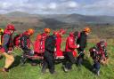Coniston MRT stretchered the man down the road