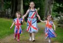 Courtney, four, Hayley, 11, and Jodie, three, Simpson leaving the village church after the Jubilee service