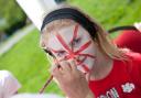 Abby Pearson having her face painted at the sports day