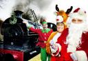 Volunteer Elf Mark Keefe, Reindeer Sue Jones and Santa ready to leave Kirkby Stephen East Station