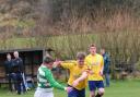 Kendal United (yellow) on the attack against their town rivals Celtic (green and white). Picture by Richard Edmondson