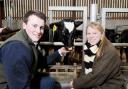 Lawrence Wallace and Tamsin Brown, Year 12 & 13 pupils respectively at Sedbergh School, get up close and personal with cows at Low Sizergh Barn