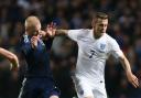 FRIENDLY: England's Jack Wilshere tussles with Scotland's Steven Naismith but is it really that important?