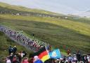 Crowds watch the Tour de France riders pass over the Buttertubs Pass, where Patrick McDonagh sustained fatal head injuries