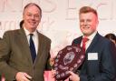 Heysham 1 power station’s Joe Dickinson receives his EDF Energy apprentice of the year award from EDF Energy’s CEO Vincent de Rivaz