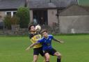 Action from the Ibis versus Windermere match (Picture by Richard Edmondson)