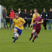 Action from the Kendal County v Kendal United Invitation Cup semi final