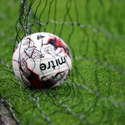 File photo dated 25/08/15 of a view of a football in the back of a net. MSPs will quiz football association bosses on progress to improve child protection in the sport when they return to Holyrood today. PRESS ASSOCIATION Photo. Issue date: Tuesday