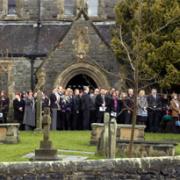 FAREWELL: Some of the hundreds of mourners