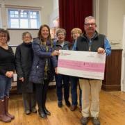 DELIVER: Sarah Bowman of the National Lottery Community Fund presents the cheque for £33,000 to High Wray Village Hall Trustees