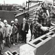 Chair of the governors of Endmoor School Olive Clarke (second left) with other governors and building contractors when they had a conducted tour of the new school site in October 1989. Work on the building was well under way