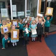 CORRESPONDENCE: Pupils with their letters and drawings  for the Queen