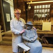 Alan Ward stood next to his sculpture of Beatrix Potter, which was then sent to a foundry in Wales to be cast in bronze.