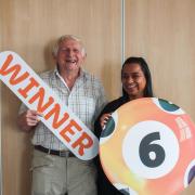 Robert Woof winning Galloway's first ever charity lottery £25k jackpot