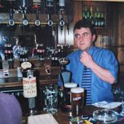 John Gallagher behind the bar during his tenure at The Albion