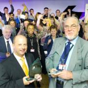 WINNER Marl International Limited's Managing director Adrian Rawlinson and development director David Ford are pictured with workers celebrating their success