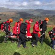 Coniston MRT stretchered the man down the road