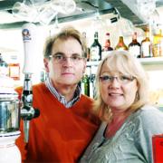 CHARACTER PUB: John and Diane Taylor behind the bar at The Masons Arms