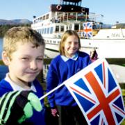 COUP: Heron Hill’s Sam Tattersall and Ellie Maplethorpe prepare to welcome the Olympic torch