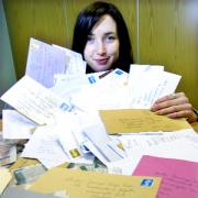 LOTTA LETTERS: Reporter Helen Perkins with some of the petitions returned to the Westmorland Gazette.