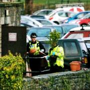 WEED: Police officers take away cannabis plants from the closed toilet block at New Road, Kendal