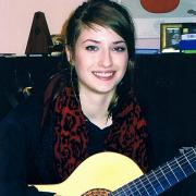 Kendal girl merits top guitar grade