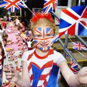 Lauren Taylor (front) leads celebrations at High Bentham Primary School's Jubilee party