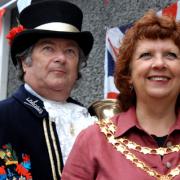 Ulverston town crier Peter Winston and the town's mayor, Coun Brenda Marr