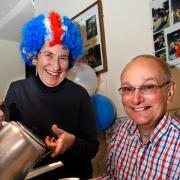 Val Dixon serves a cup of tea to Rob Shrapnel at the Field Broughton celebrations