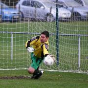 Phillip King saves a penalty for Kendal County in their 1-0 win over Todmorden Borough. Picture by Richard Edmondson