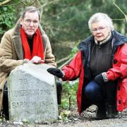Tony Emmerton and Lilian Hartley Cole with the stone set to be reinstalled