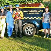 Young people from Dallam School, Milnthorpe, and Queen Elizabeth's School, Kirkby Lonsdale, on a visit to HM Coastguard at Arnside. The students are pictured with Station officer Nigel Capstick and Coastguard Andrew Pringle