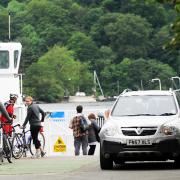 Cars roll off the Windermere ferry