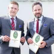 Mark Needham, left, from Waterhead, and Matt Stanaway, from The Midland, display their Gold Green Business Tourism Awards